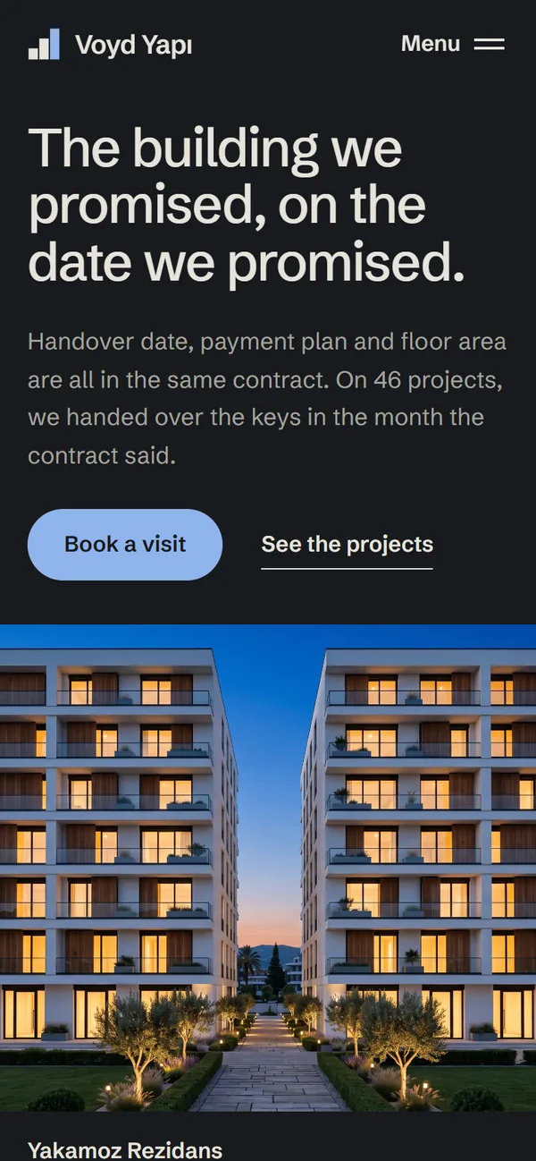 Voyd Yapı home page on a phone, dark theme: headline, short description, visit button and a link to projects, above a photo of the residential blocks at dusk.